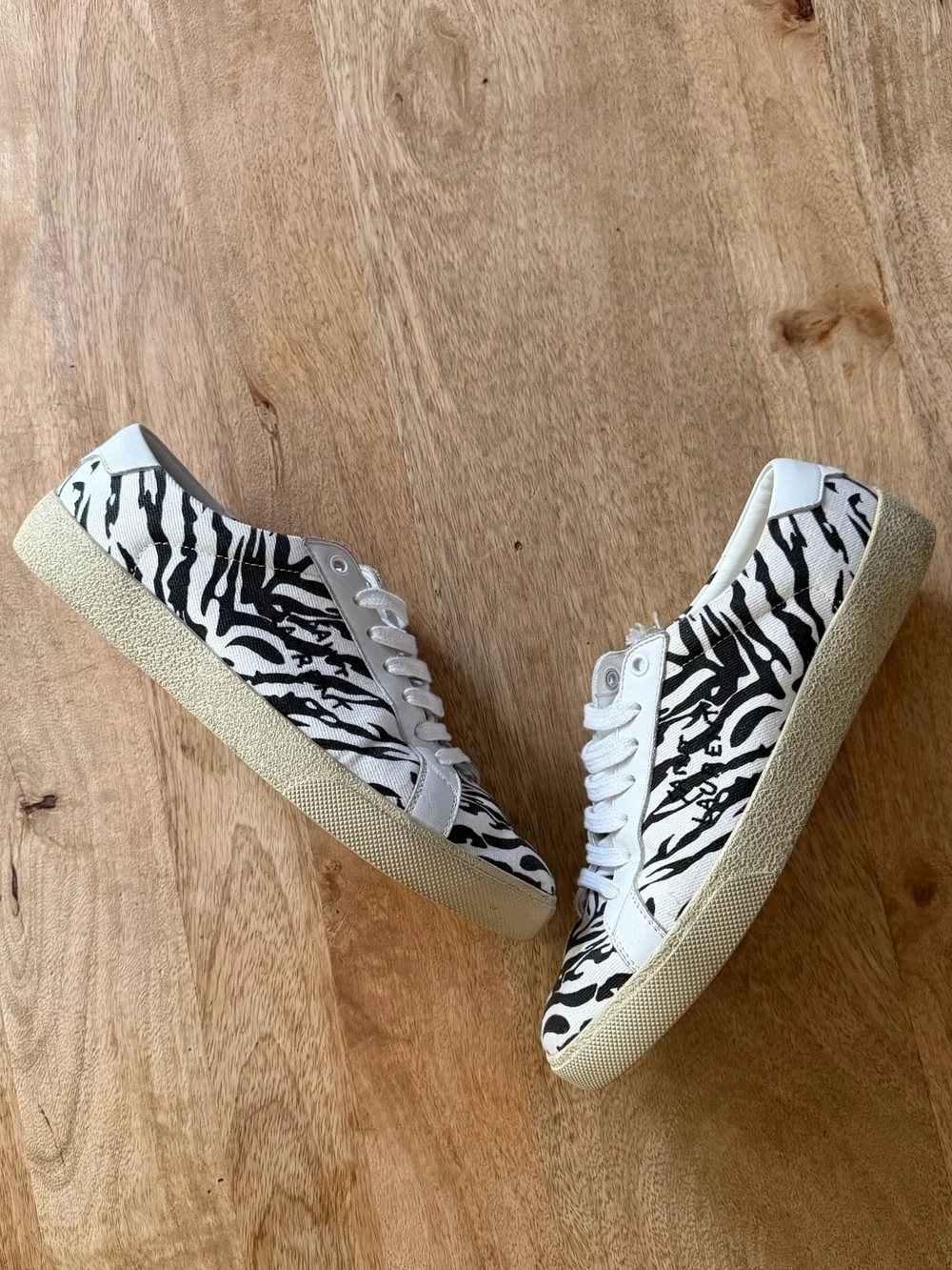 Saint Laurent Paris Zebra Print Lace-Up Sneakers in White and Black